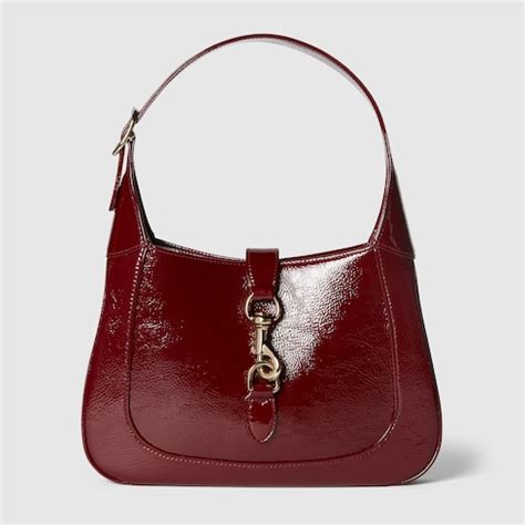 Gucci Jackie small shoulder bag in Rosso Ancora .